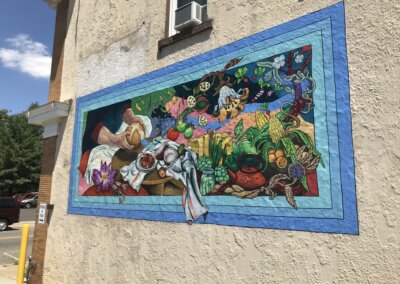 Alum creates public mural celebrating multiculturalism