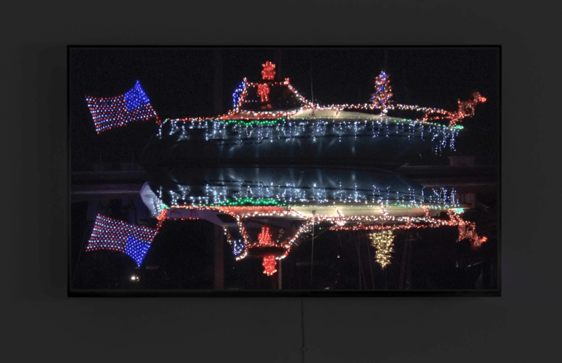 Artwork of lights on a TV with a dark background.